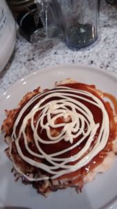 Japanese mayonnaise on top of the okonomi sauce.